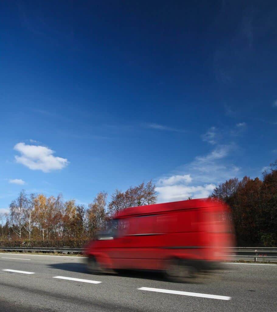 Van driving on main road