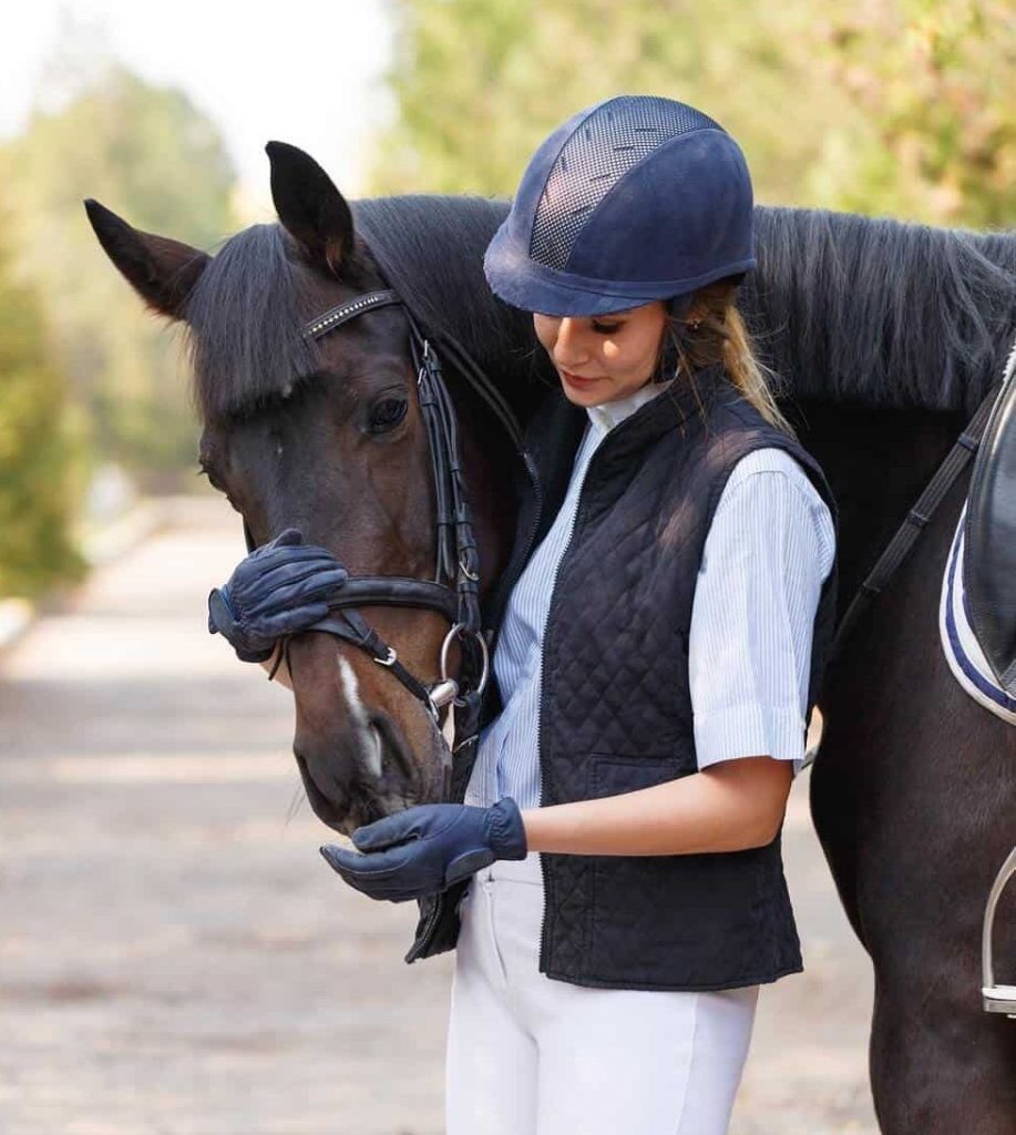 Horse rider with her horse