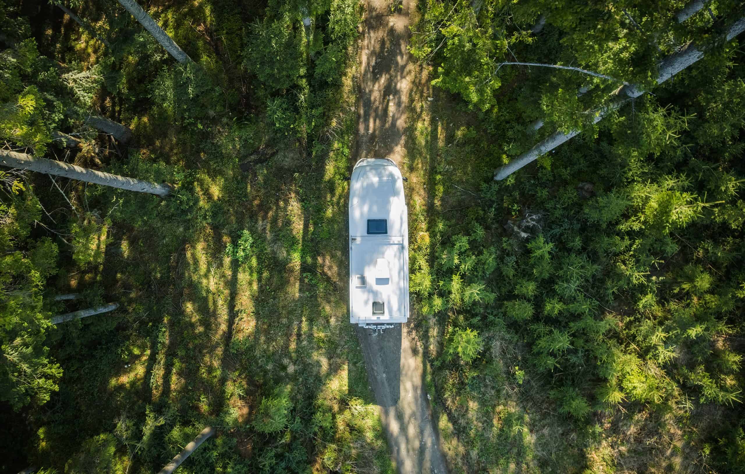 Topdown view of motorhome in forest