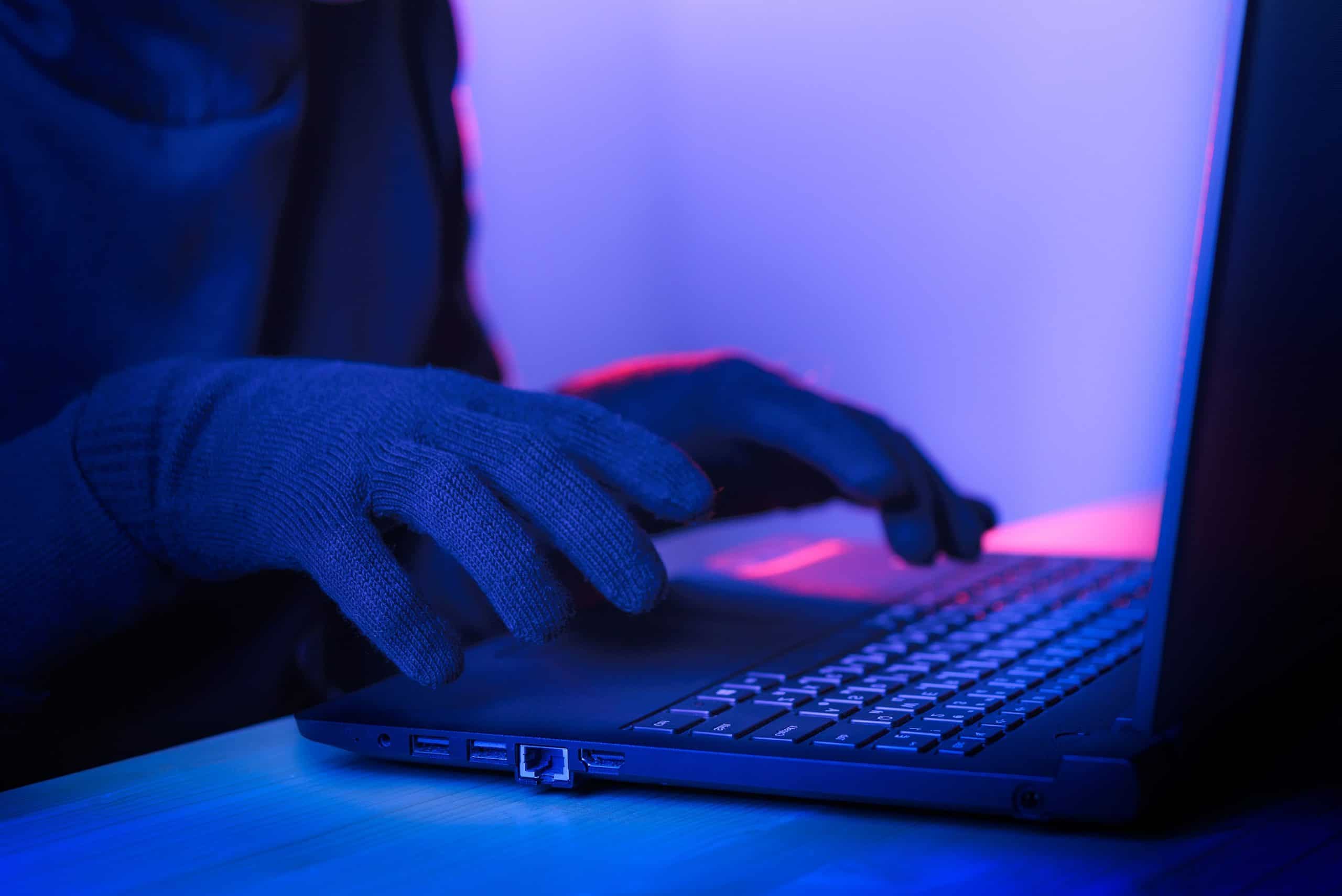 Hacker on laptop