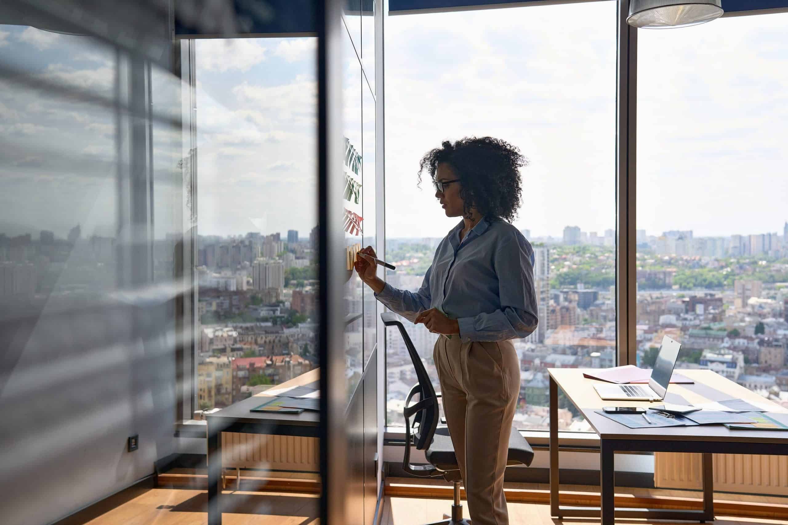 Woman at whiteboard