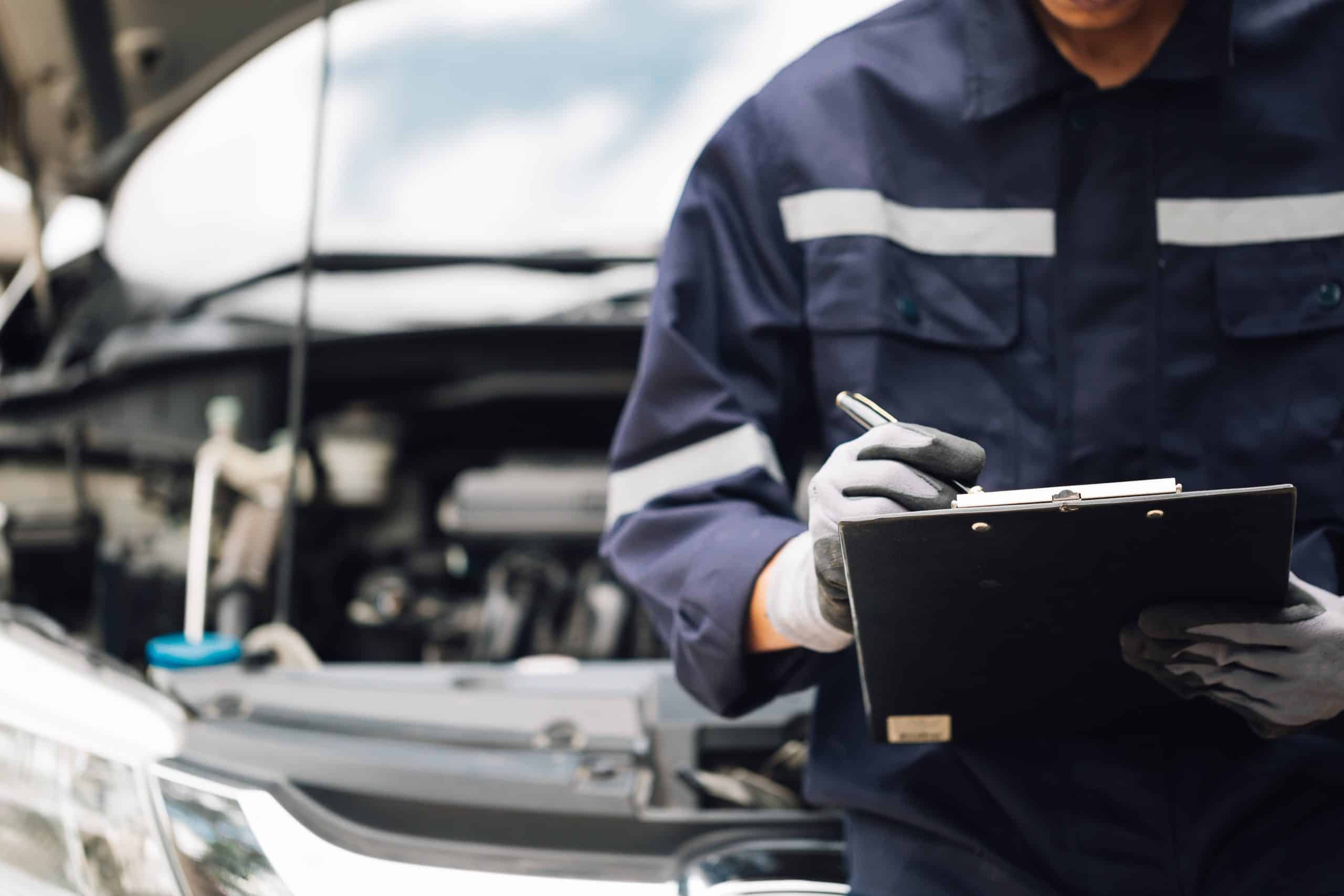 Man checking car