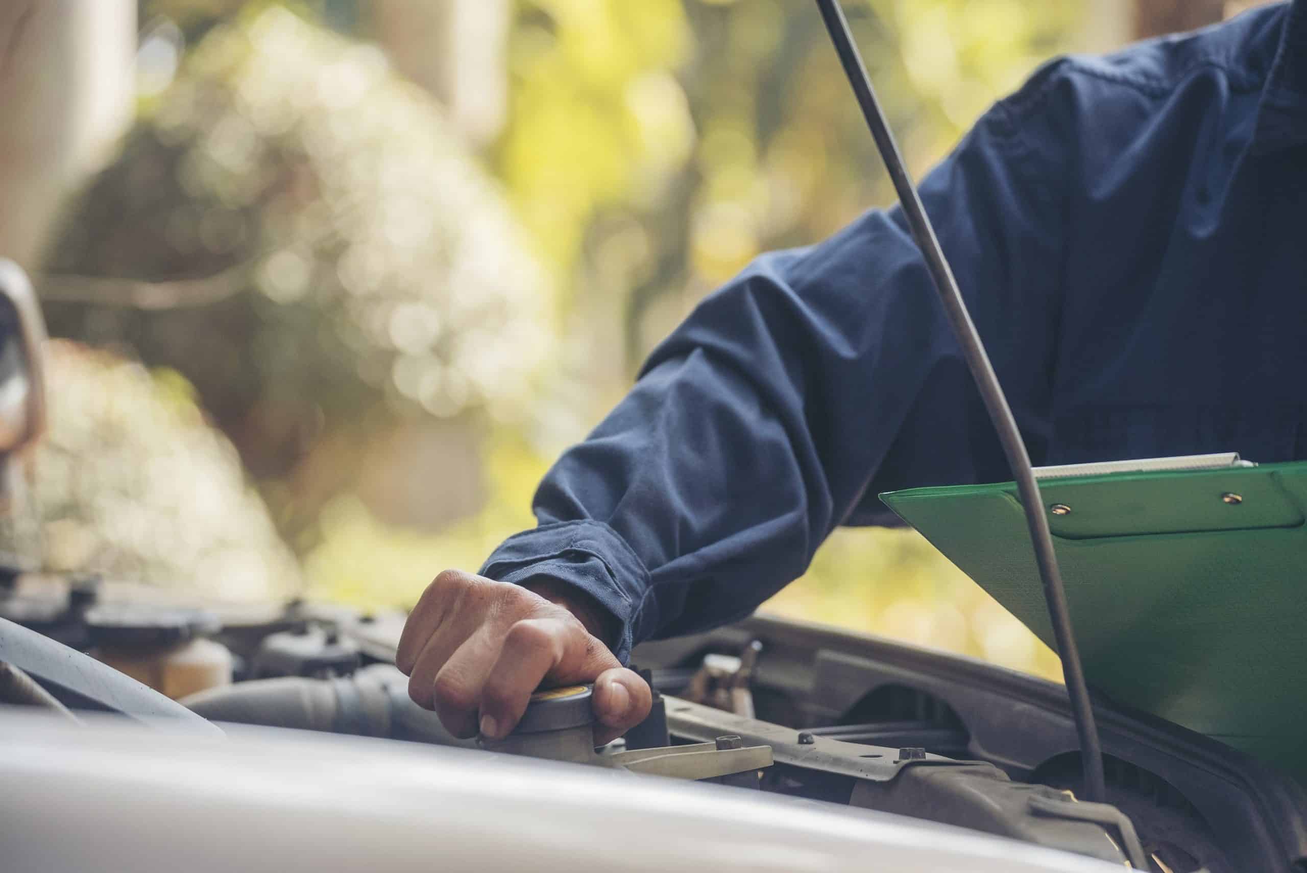 Mechanic working on car