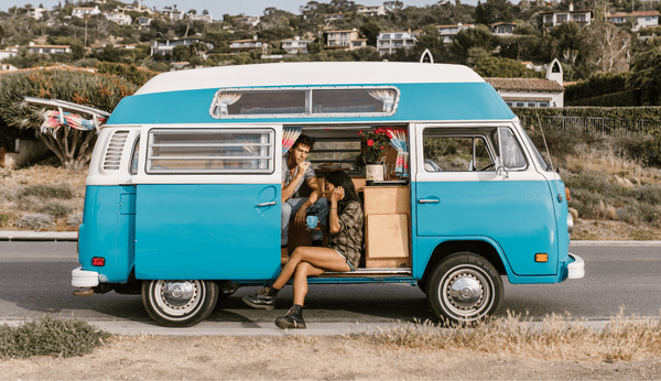 Couple in converted campervan